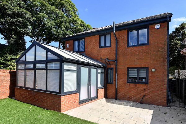 Property at 22 Heys Lane, Heywood, OL10 3RA to show front and rear with windows installed.Property at 22 Heys Lane, Heywood, OL10 3RA to show front and rear with windows installed (not conservatory).