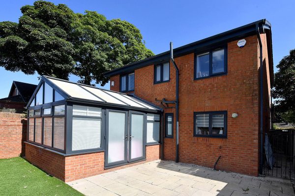 Property at 22 Heys Lane, Heywood, OL10 3RA to show front and rear with windows installed.Property at 22 Heys Lane, Heywood, OL10 3RA to show front and rear with windows installed (not conservatory).